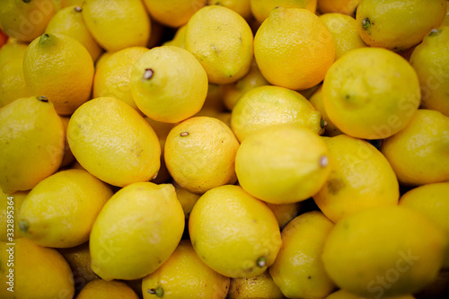 Fresh organic lemons on a market shelf