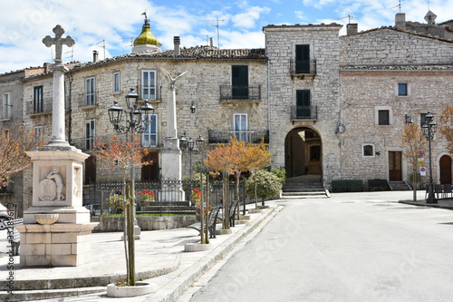 A square among the old houses of the medieval village of Oratino, in Italy. photo