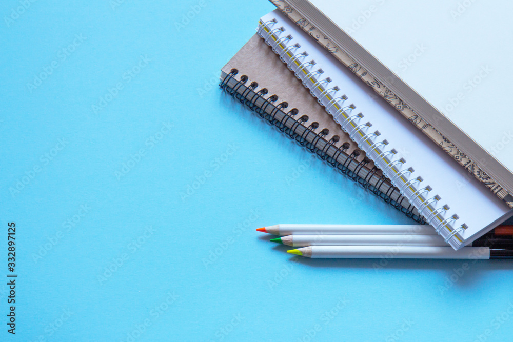 Set of stationery on blue background. Flat lay Set of stationery on blue background. Flat lay