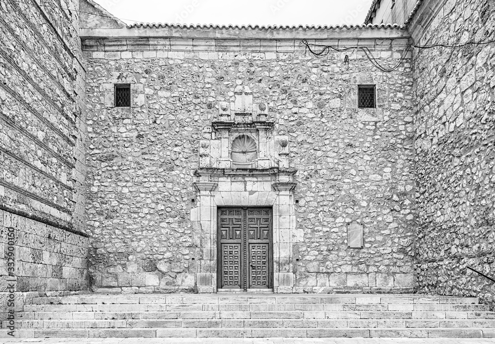 Door of Santiago Apóstol curch, Noblejas, Toledo, Spain. Built in the seventeenth century in Herrerian style. Door of Santiago Apóstol curch, Noblejas, Toledo, Spain. Built in the seventeenth century in Herrerian style.