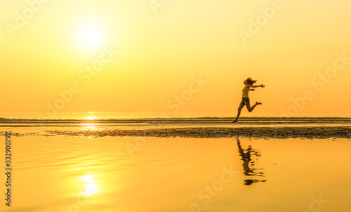 Woman jump in the sunlight.