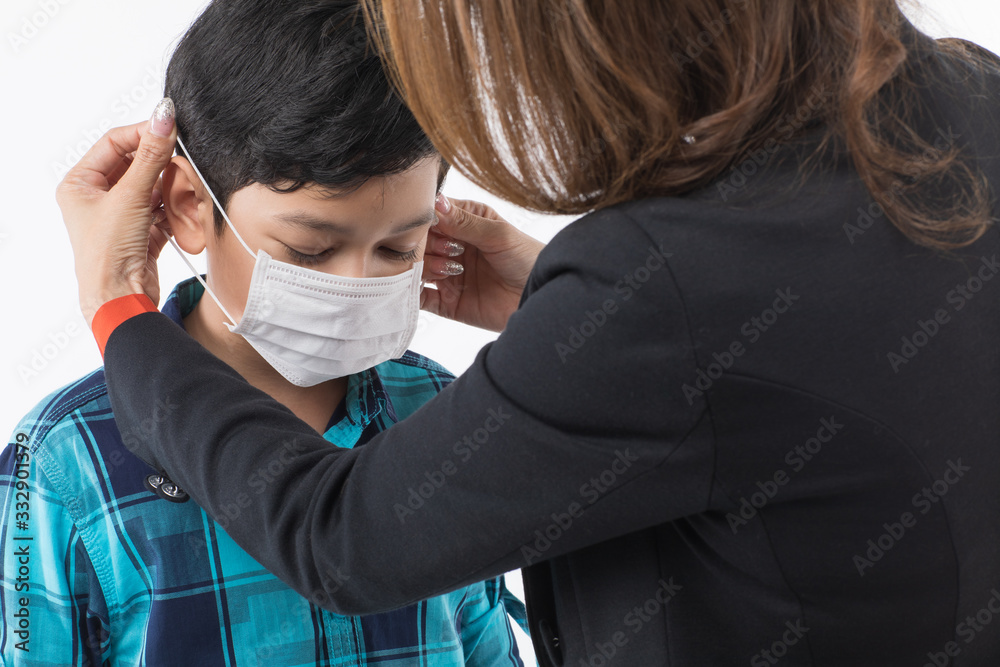 Fototapeta premium Mother wearing surgical mask for son.