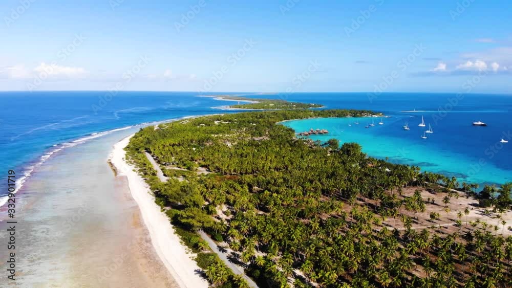 Rangiroa the largest atoll of the Tahiti Islands in French Polynesia. It is an immense ring of sand and palm trees about 80 km long. Rangiroa the largest atoll of the Tahiti Islands in French Polynesia. It is an immense ring of sand and palm trees about 80 km long.