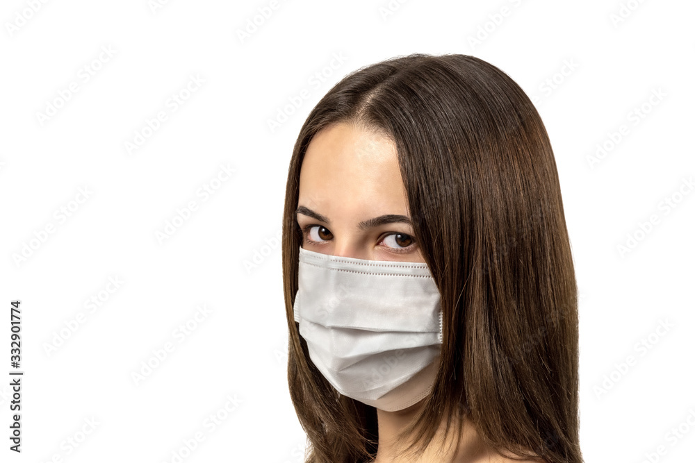 Girls in medical masks are protected from the epidemic of coronavirus isolated on a white background Girls in medical masks are protected from the epidemic of coronavirus isolated on a white background