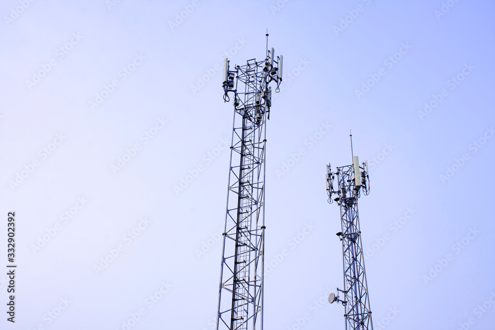 Telecommunication tower with blue sky. Antenna on blue sky. Radio and satellite pole. Communication technology Telecommunication tower with blue sky. Antenna on blue sky. Radio and satellite pole. Communication technology