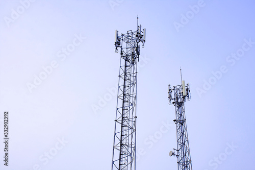 Telecommunication tower with blue sky. Antenna on blue sky. Radio and satellite pole. Communication technology
