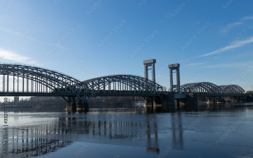 St. Petersburg - March 18, 2020: Railway bridge over the Neva river. Zheleznodorozhny Bridge 