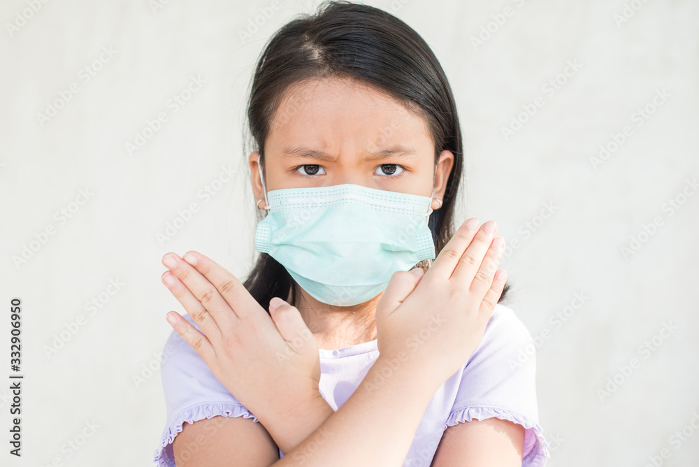 coronavirus asian woman wearing flu virus mask prevention. asian little girl wearing protective face mask for plague coronavirus. show stop hands gesture for stop virus outbreak epidemic symptoms.