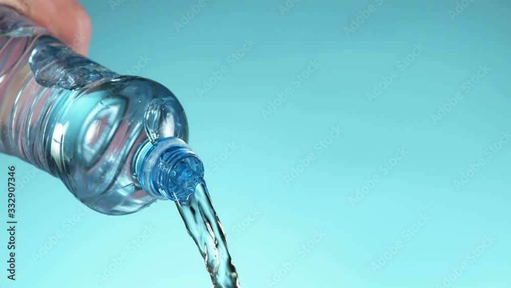 Super slow motion of splashing water from bottle. Filmed on very high speed camera, 1000 fps. Super slow motion of splashing water from bottle. Filmed on very high speed camera, 1000 fps.