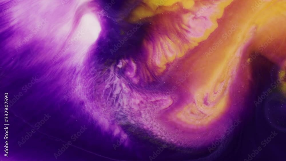 Fluid art. Abstract acrylic textures with flowing effect. Fancy fluid surface drawing. Acrylic fluid art with liquid colourful patterns, close up view. Purple, orange and gold multicolored surface