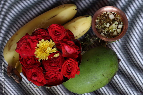 Ugadi telugu new year andhrula pachadi with mango leaves photo