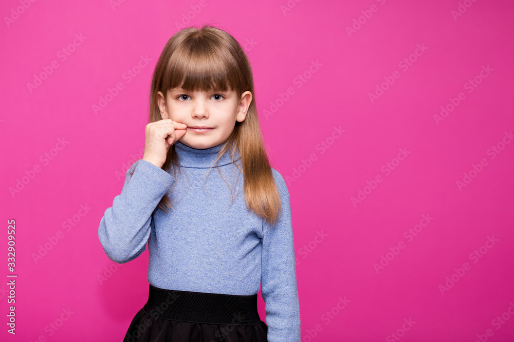 Beautiful little girl making keep quiet gesture, shows sign of mouth on lock, secret, isolated over pink Beautiful little girl making keep quiet gesture, shows sign of mouth on lock, secret, isolated over pink