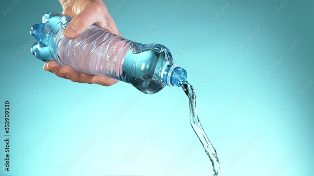 Super slow motion of splashing water from bottle. Filmed on very high speed camera, 1000 fps. Super slow motion of splashing water from bottle. Filmed on very high speed camera, 1000 fps.