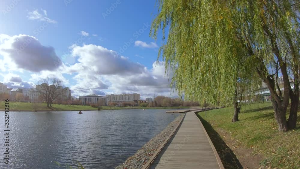 Wooden walkway by the pond Wooden walkway by the pond