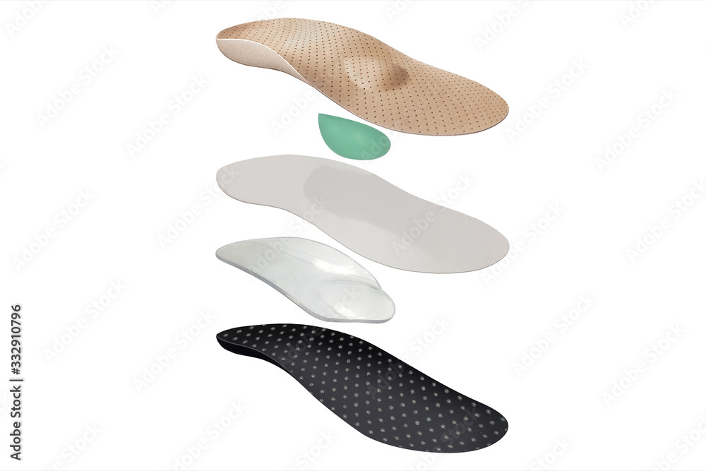 Isolated orthopedic insole on a white background. Treatment and prevention of flat feet and foot diseases. Foot care, comfort for the feet. Wear comfortable shoes. Medical insoles. Isolated orthopedic insole on a white background. Treatment and prevention of flat feet and foot diseases. Foot care, comfort for the feet. Wear comfortable shoes. Medical insoles.