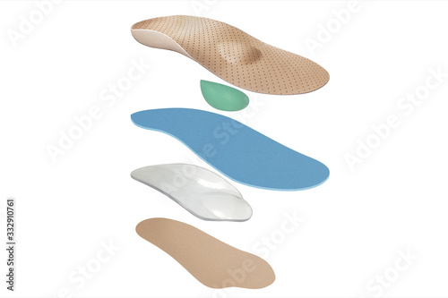 Isolated orthopedic insole on a white background. Treatment and prevention of flat feet and foot diseases. Foot care, comfort for the feet. Wear comfortable shoes. Medical insoles.