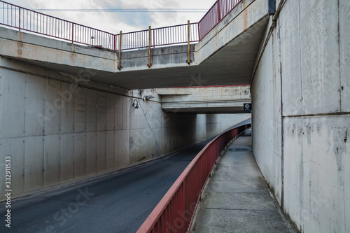 Fototapeta Naklejka Na Ścianę i Meble -  Little Italian city during an epidemic. Roadway. Tunnel. Deserted streets. No people. No cars. No one. Manzano, Friuli-Venezia Giulia. Italy