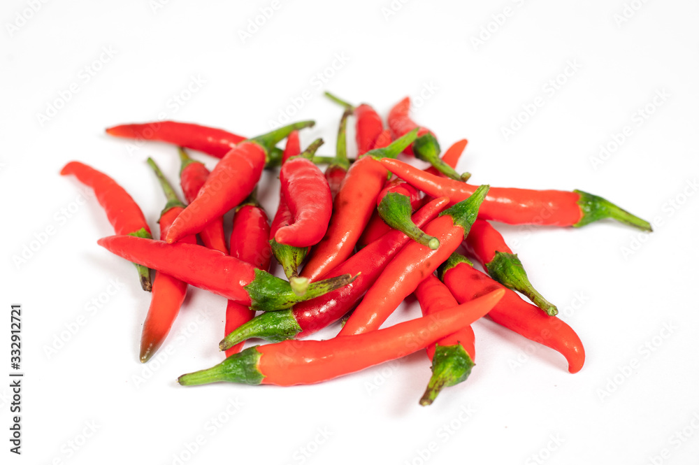 Fresh chilies on a white background.