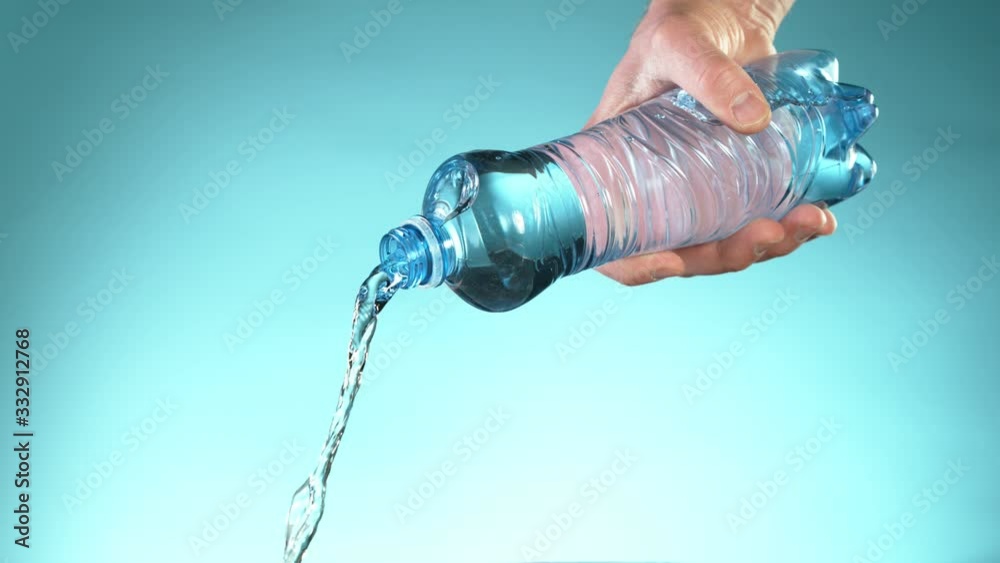 Super slow motion of splashing water from bottle. Filmed on very high speed camera, 1000 fps.