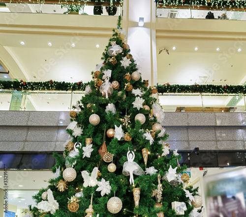 Christmas tree at Galerija Centrs in old Riga photo