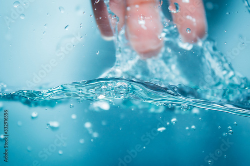 The water that is moving is a wave in a glass of water.