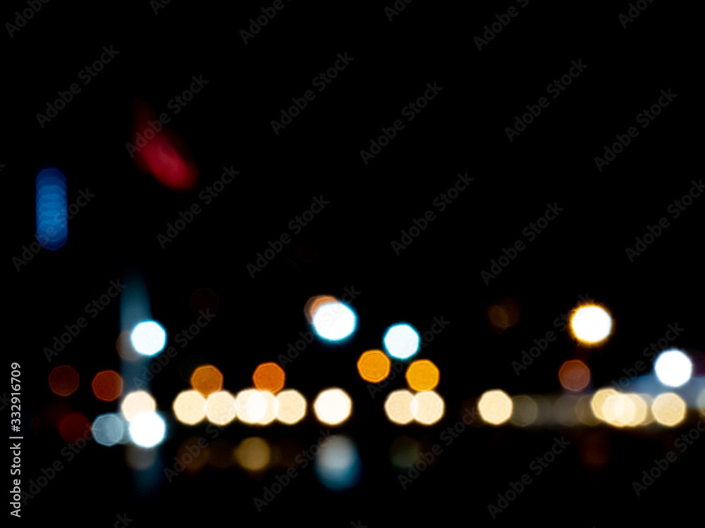 Colorful defocused bokeh color lights abstract background.