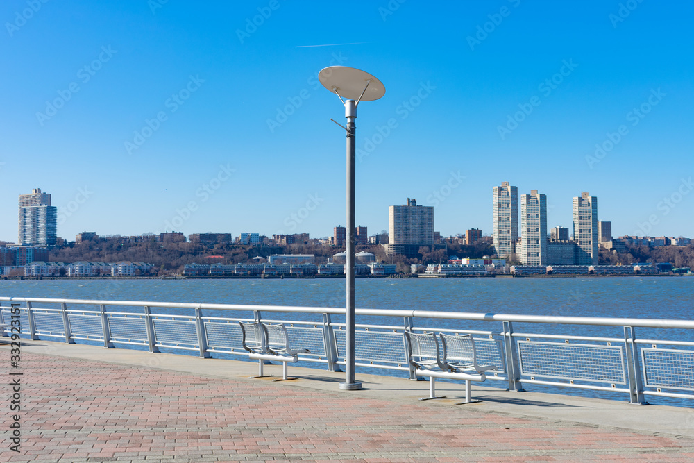 Pier I with No People along the Hudson River in Lincoln Square of New York City with a Clear Blue Sky