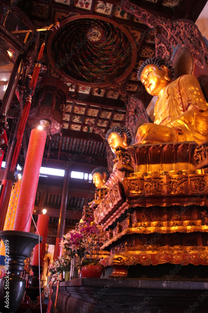  Golden Buddha sculptures located in the Great Hall of the Jade Buddha Temple in Shanghai