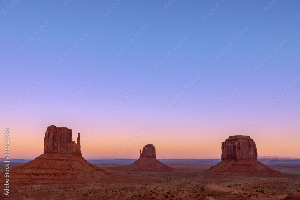 Beautiful sunset over famous Buttes of Monument Valley on the border between Arizona and Utah, USA