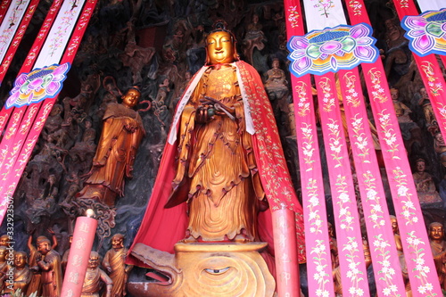 Photography Golden buddha statue in the temple of the Jade Buddha in Shanghai