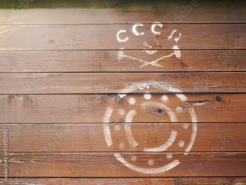 Ussr writing in russian near emblem with sickle and hammer on wooden background of carriage of a freight train, copy space, 9 may victory day concept