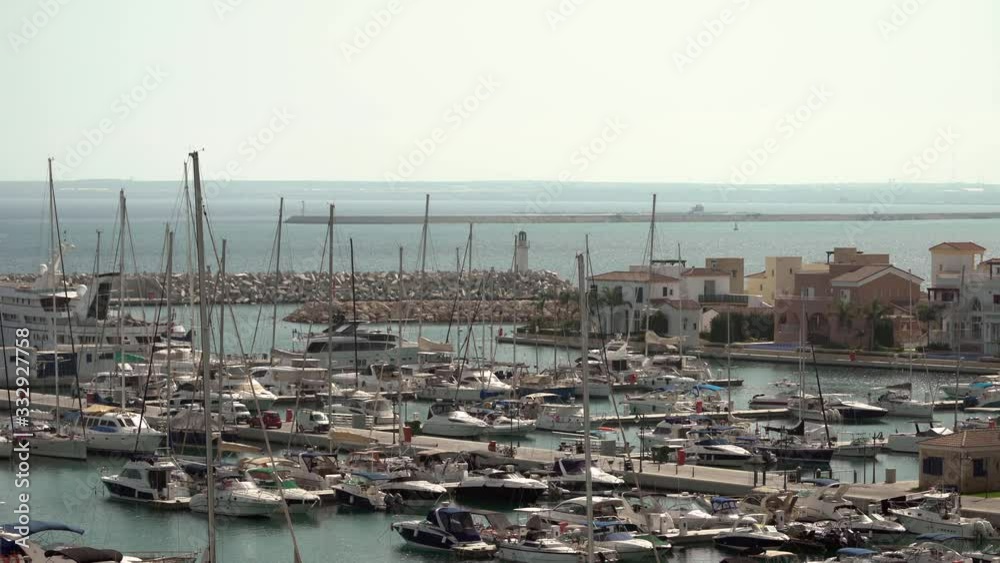 Yachts and boats in peaceful marina area in summer morning, beautiful seascape. Limassol, Cyprus, 4K Yachts and boats in peaceful marina area in summer morning, beautiful seascape. Limassol, Cyprus, 4K