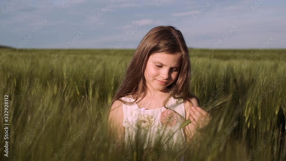 Happy Kid Is Touching Plants. Agriculture, Farming Concept. Happy Kid Is Touching Plants. Agriculture, Farming Concept.