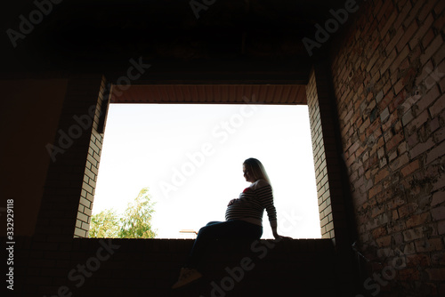 Young preganant woman expecting a baby relaxing © nagaets