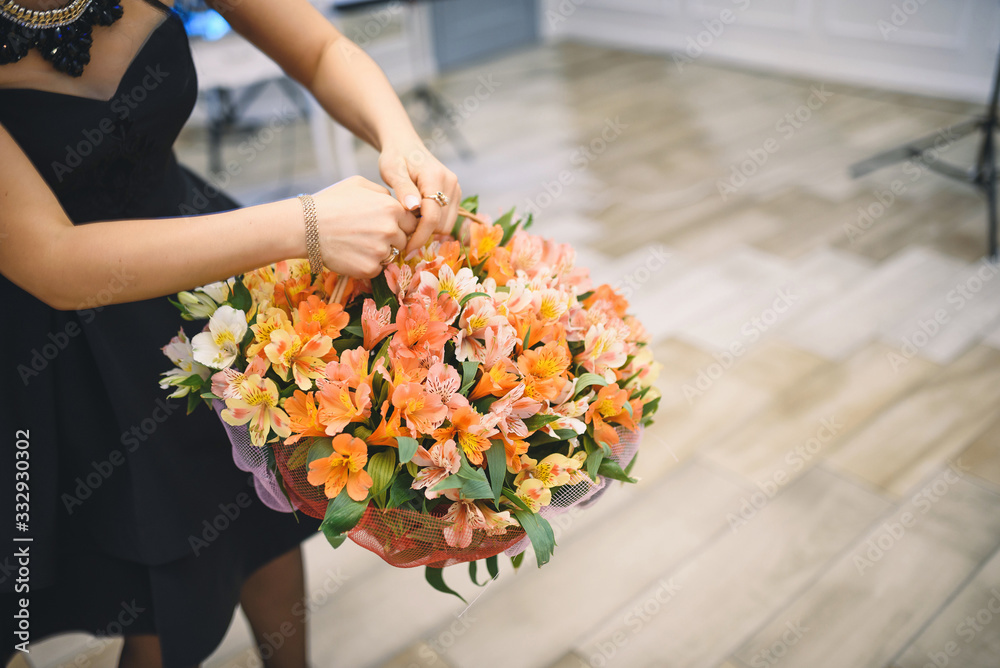 woman holding basket with flowers woman holding basket with flowers