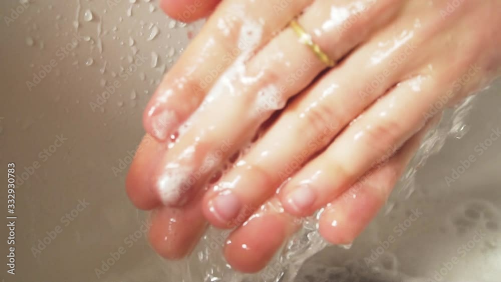 Washing Hands with Soap and Water to flush the Germs away, Slow Motion Washing Hands with Soap and Water to flush the Germs away, Slow Motion