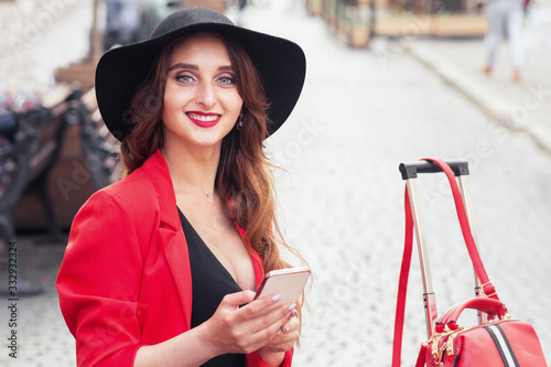 Woman holds smaptphone. photo