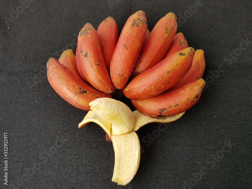  Red banana (Musa acuminate)  Musaceae fami ly. Is a wired tape of banana, it's an triploid cultivar of the wild banana Musa acuminata, belonging to the AAA group. Amazon, Brazil photo