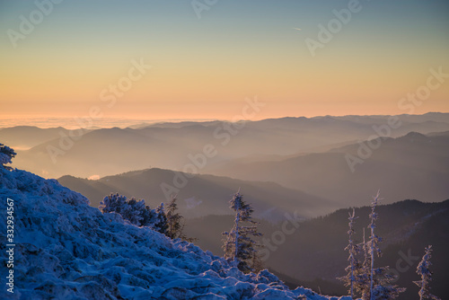 Mountain sunrise scene in winter