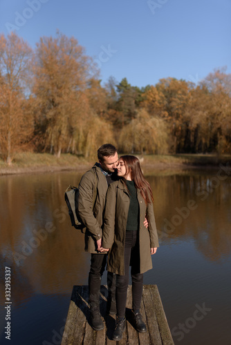 Lovely couple spending autumn day outdoors