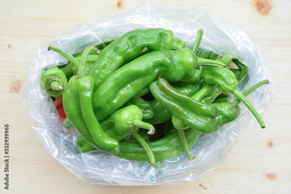 Fresh BIO Green Peppers on Wooden Table
Fresh BIO Green Peppers on Wooden Table