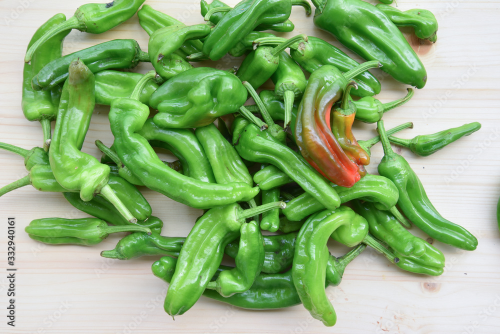 Fresh BIO Green Peppers on Wooden Table
Fresh BIO Green Peppers on Wooden Table