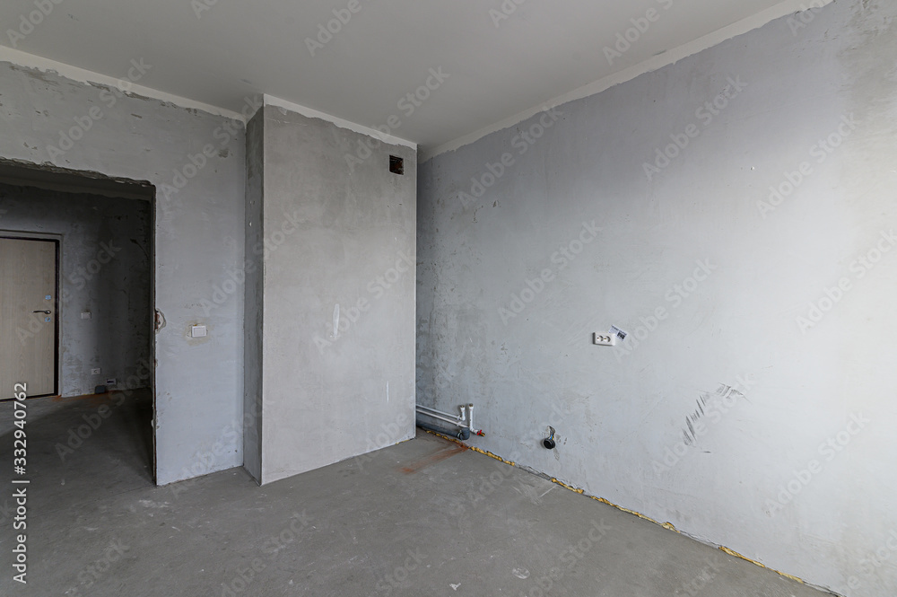 Russia, Moscow- November 20, 2019: interior room apartment rough repair for self-finishing. interior decoration, bare walls of the room, stage of construction