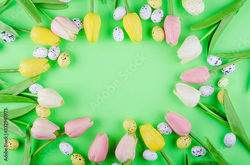 Easter decorited eggs and tulips photo