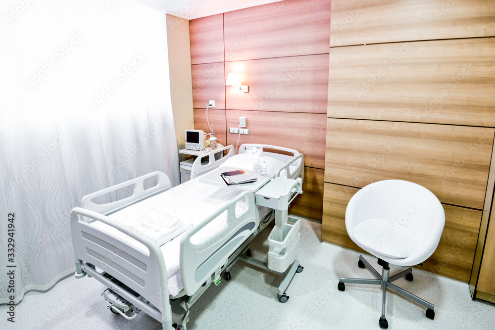 Clean empty beds in a hospital chamber Clean empty beds in a hospital chamber