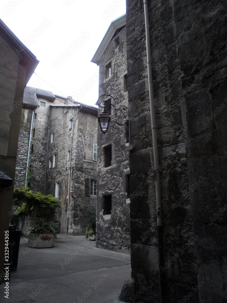 Chambéry, France - August 5th 2011 - Focus on very old facades of a medieval court, in the city center.