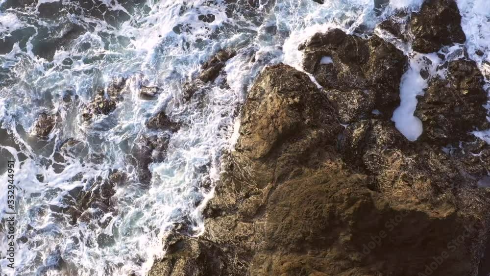 View of the pacific waves crashing against rocks in the Southern Oregon Coast View of the pacific waves crashing against rocks in the Southern Oregon Coast
