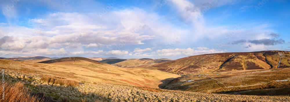 Panorama of Cheviot Hills from the Pennine Way, at Brownhart Law, a summit on the line of the Scottish - English Border in the Cheviot Hills