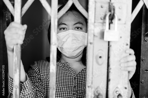 Stay at home or Quarantined woman.Coronavirus covid-19 infected patient in coronavirus covid 19 quarantine home.Asian woman wearing mask quarantine lockdown at home.coronavirus outbreak control.