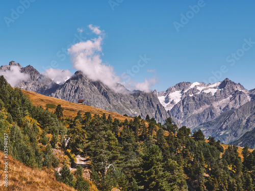 Panoramic view of high mountains of Svaneti region of Caucasus mountains on a sunny day